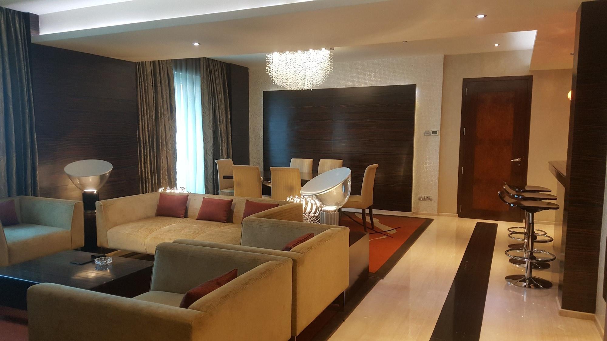 Vivanta Hyderabad, Begumpet Ngoại thất bức ảnh A living room in a suite at the Ritz-Carlton, DIFC